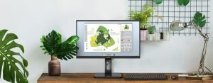 una scrivania con un monitor aoc