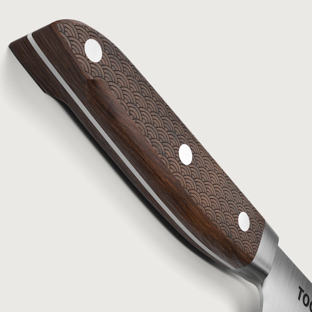 un manico di un coltello TOG con il motivo ornamentale