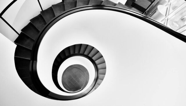 aerial photo of black spiral staircase
