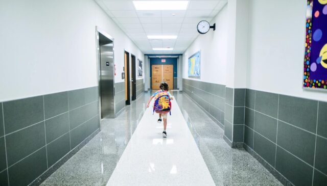 boy running in the hallway