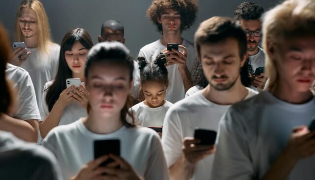 photo of people engaged on their phones