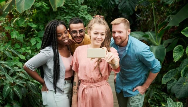 photo of people taking selfie