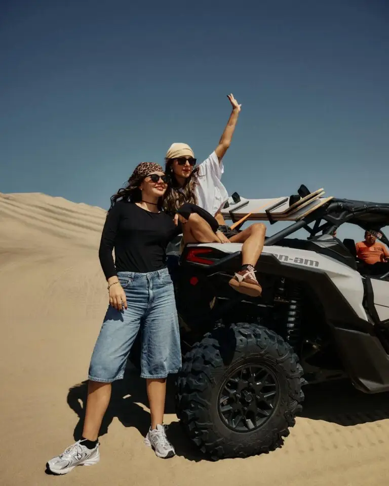 two friends enjoying an atv adventure in the desert