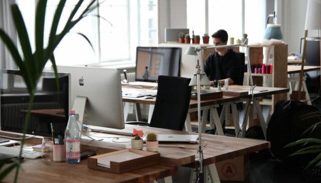 man sitting in front of computer