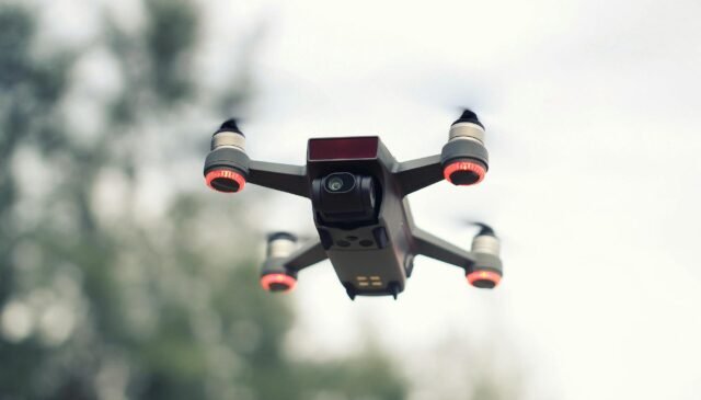 black and red quadcopter drone