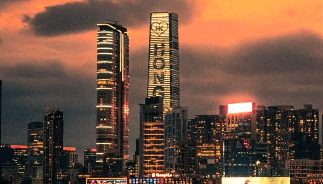 vibrant cityscape at sunset with iconic skyscrapers