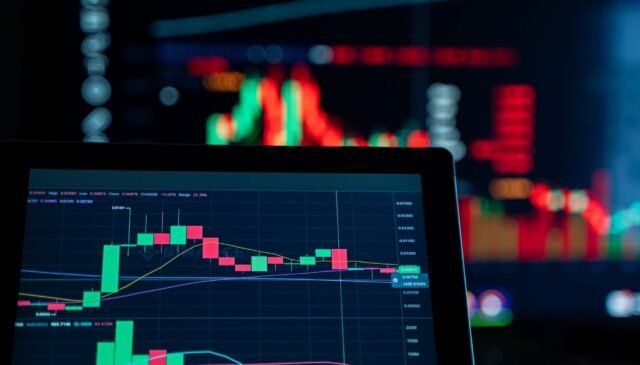 financial market trading screen with graphs and charts
